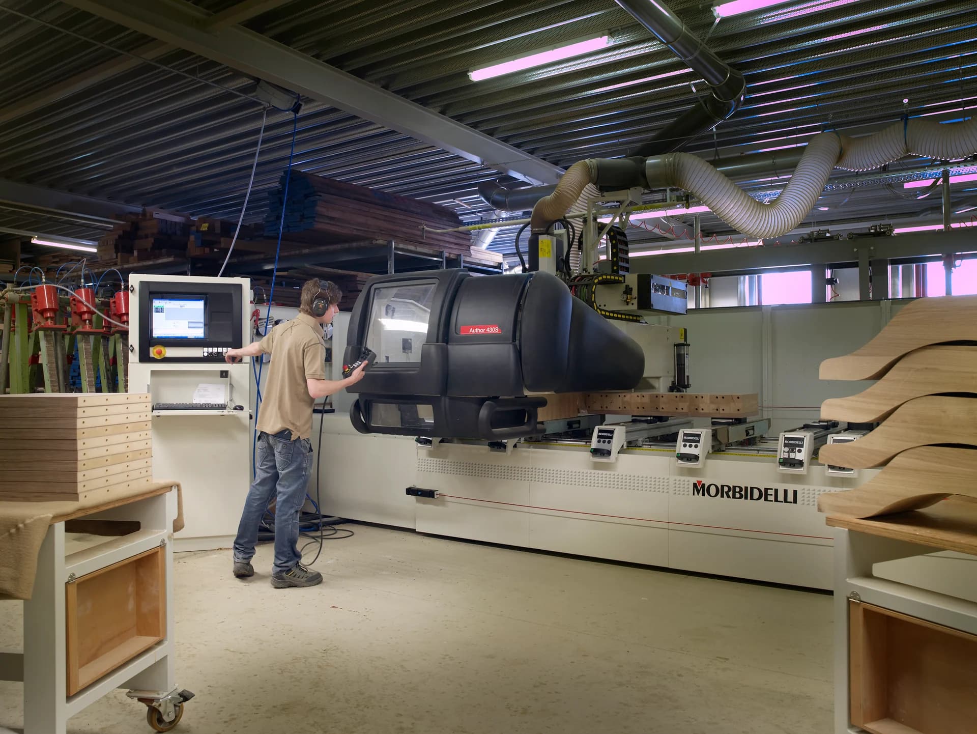 Multi-axis CNC machine in operation — illustrative