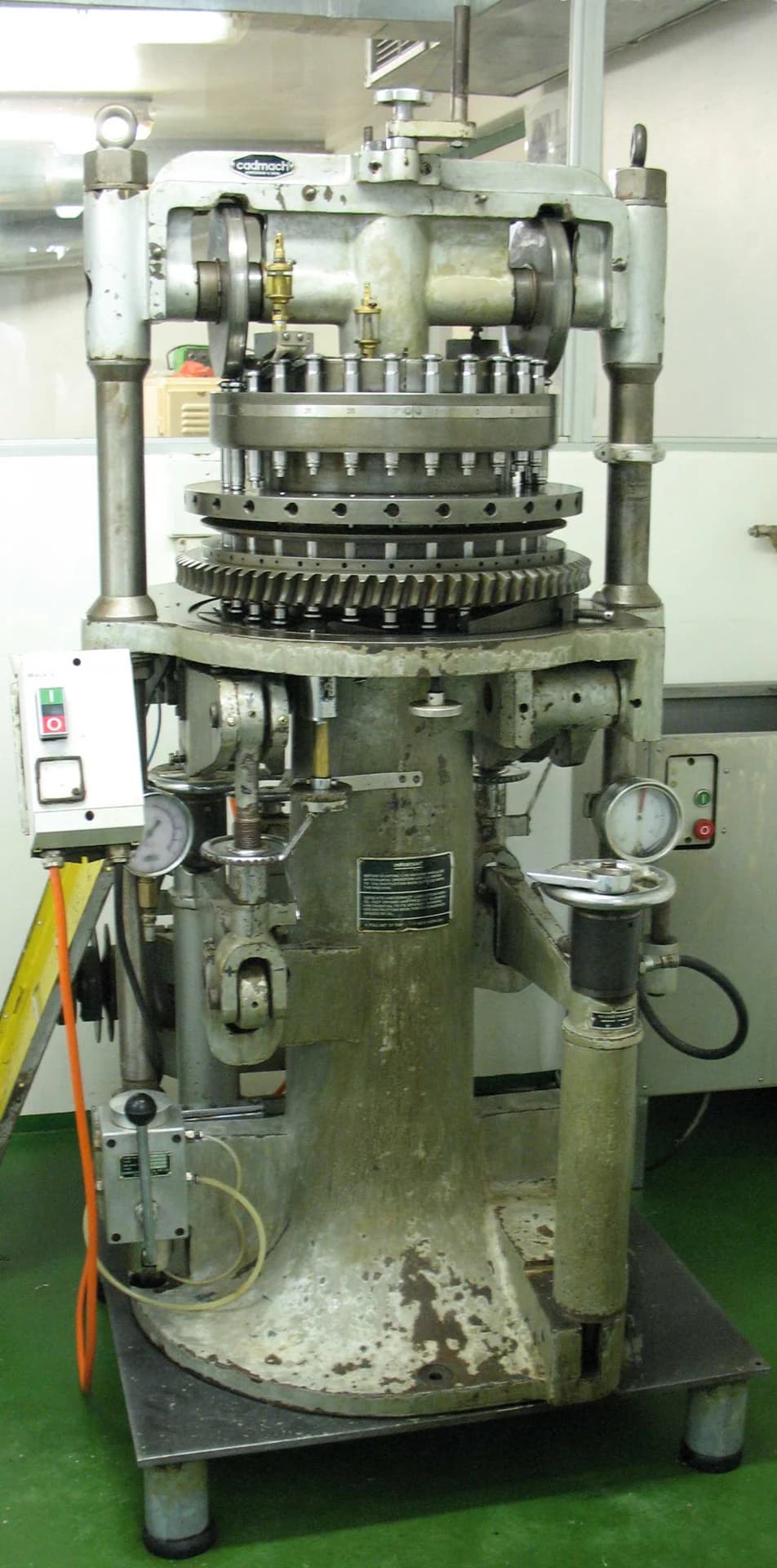 Pharmaceutical tablet press — illustrative